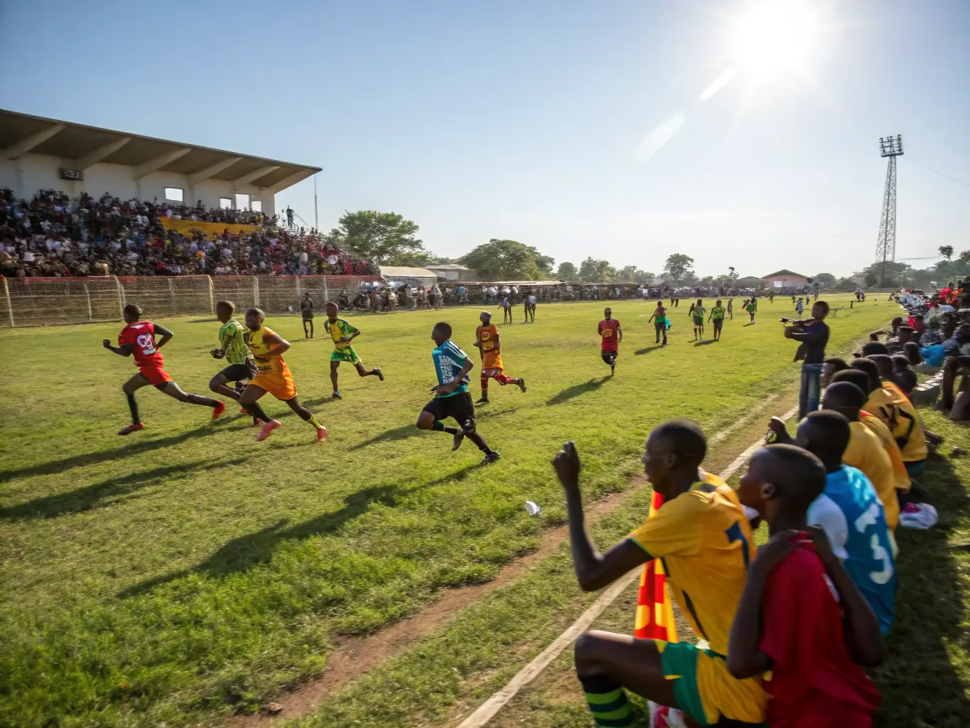 An action shot from a community tournament, showing participants engaged in a friendly competition, emphasizing UMQB's focus on sports and recreational activities.